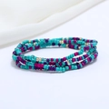 Close-up of double-layered beaded waist chain in turquoise, magenta and metallic gold - 80cm / Turquoise/Magenta/Gold