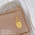 Macro shot of gold Virgin Mary portrait pendant with crystal details and measurements - Gold (A131)
