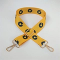 Detail of yellow daisy pattern fabric bag strap with golden metal swivel hooks - No. 14 Yellow Orange Floral