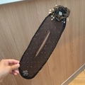Elegant black mesh bun maker hair tool with small pearls and a floral crystal accent - Black Flower