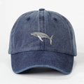 Vintage navy blue washed denim baseball cap featuring detailed whale embroidery on the front - Navy Blue