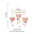 Pink watermelon baby mobile featuring plush toys and wooden ring for infant crib - Watermelon Mobile