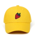 Detailed view of yellow baseball cap with red strawberry embroidery and six-panel crown - Adjustable / Yellow