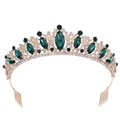 Golden bridal crown with emerald gemstones and sparkling rhinestones on white background - Gold Green Rhinestone