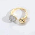 Detail of 18K gold open ring featuring one polished ball and one pavé zircon sphere - Gold Double Ball Open Style
