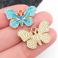 Schmetterling-Anhänger in Blau und Gold für DIY-Schmuckherstellung auf Fingerspitzen - Blauer Schmetterling (15x22 mm)
