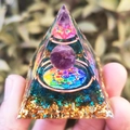 Orgonite energy pyramid with amethyst sphere, copper coil, and mandala base in hand - Glaze Purple Ball Geometric Mandala / Small