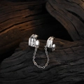 Silver star tassel ear cuff set with chain and crystals on a dark wood background - Copper / White Gold