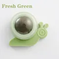 Snail-shaped catnip wall toy in fresh green with a rotating catnip ball and clear cover - Snail / Green
