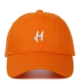 Close-up of premium orange twill cotton baseball cap with white embroidered H letter - Orange