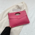Fuchsia crocodile pattern clutch handbag with integrated handle and gold snap closure - Pink