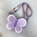 Detail showing purple silicone butterfly bag with colorful rainbow striped shoulder strap - Single-Sided Butterfly / Lavender