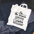 White canvas tote bag with black motivational quote print on blue denim background - C5/No Inner Pocket No Zipper