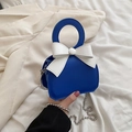 Mini handbag in blue with a large white bow and silver chain strap for women - Blue