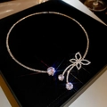 Detailed view of silver butterfly choker with zircon flowers and tassels in a gift box - Silver Rhinestone Zirconia Butterfly Choker