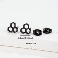 Detail showing matte black honeycomb stud earrings with measurements 0.8cm and 2g weight - 055 Honeycomb Black