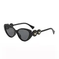 Lunettes de soleil œil de chat noir brillant avec des étoiles dorées sur les branches - Noir