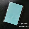 Detail of light blue A5 tissue paper pack of 100 sheets on a black wooden background - Light Blue (100 Sheets/Pack)