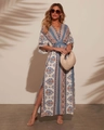 Detail of bohemian floral maxi dress featuring a deep V-neck and high side leg slit - S / Dark Blue