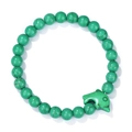 Beaded bracelet featuring turquoise green round stones and a dolphin-shaped charm accent - Green