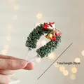 20cm Christmas U-shaped wreath cake topper with green pine, red bow and golden bell - Rattan Style