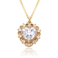 Detailed macro view of 18k gold heart pendant with white zircon and vintage hollow crafts - Large Heart Zirconia Style (c556)