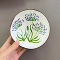 Natural coconut shell bowl with blue floral interior and textured outer surface - Dandelion Pattern