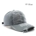 Vintage blue washed cotton baseball cap with heavy distressed details and ripped edges - Blue
