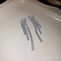 Close-up of silver tassel earrings featuring sparkling crystal rhinestones and sleek metal finish - Simple Silver Tassel (2#)