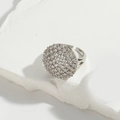 Silver micro-paved zircon open ring with a round design on white textured stone - Round