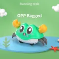 Running bubble crab toy in cyan color with inertial wheels and bubble blower structure - OPP Bag / Green