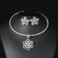 Silver bridal jewelry set with floral zircon necklace and earrings on black bust - Silver Snowflake Necklace Earring Set