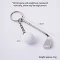 Silver metal golf club and ball keychain pendant with dimensions and weight specs - White Golf Ball + Club