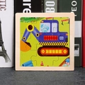Wooden 9-piece puzzle for kids featuring a blue cartoon excavator and elephant - Excavator