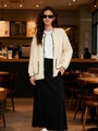 Détail d'un cardigan en maille crème avec coutures contrastées noires et poches - S / Blanc Cassé