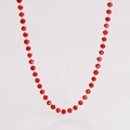 Detail of red faceted beaded necklace with small gold-toned metal connector rings - Red