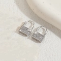 Elegante silberne Vorhängeschloss-Ohrringe mit Zirkonia und 14K Weißgold-Finish - Schloss Weißgold