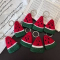 Handmade wool felt watermelon slice keychains with cute smiling face details - Watermelon Slices