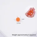 Mini dije de naranja de 1cm para manualidades con mano para escala de tamaño - Mini manzana naranja 1cm