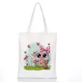 White canvas tote bag featuring a cute pink cartoon owl print with colorful nature details - Style C19 / No Zipper No Inner Pocket