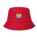 Close-up of red cotton bucket hat featuring rainbow LOVE patch with precise stitching - Adjustable / Rose Red