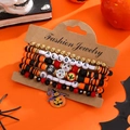 Detail of Halloween beaded bracelet set with pumpkin charms on orange background - Halloween Spooky Style 2 (25020779) / 02 KC Gold