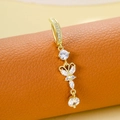 Golden butterfly belly button ring with sparkling zircon stones and a drop design - Dragonfly Pendant - Gold