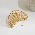 7cm golden shell-shaped hollow metal hair claw clip with a glossy finish and spring - Fan