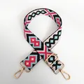 Close-up of diamond pattern jacquard bag strap with golden swivel hooks and buckles - Pattern 12