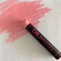 Pink heavy oil pastel crayon showing smooth texture and rich color stroke on paper - Pink