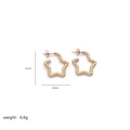 Detailed view of gold star stud earrings with twisted rope texture and size dimensions - Twist Texture Star