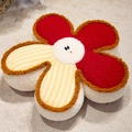 Red and striped cartoon flower plush seat cushion with a smiling white center on a soft rug - Yellow Stripe and Red / Small Style