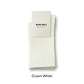 Breathable creamy white cotton mid-calf socks for women with smooth texture and brand tag - Milk White