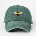 Detailed embroidery of a colorful bee on washed green cotton canvas baseball cap - One Size / Dark Green